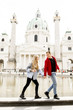 Couple walking holding hands around Vienna, Austria