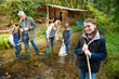 © Image Source RF - Grandparents and grandchildren exploring