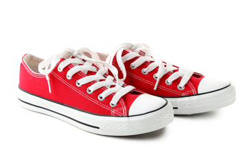 Pair of red sneakers isolated on a white