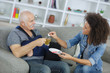 © auremar - Carer helping injured elderly patient