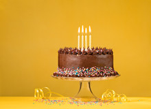 Chocolate Birthday Cake On Yellow