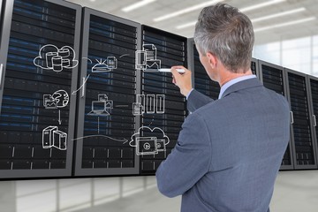 Poster - Businessman drawing in a data center
