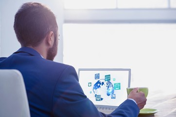 Aufkleber - businessman at desk with laptop and digital icons
