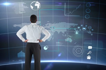 Poster - Business man from the back looking at a digital screen 