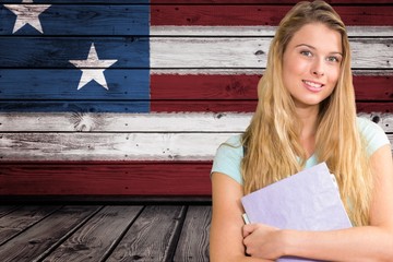 Poster - students holding notebook against American flag background