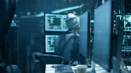 Aufkleber - Group of Hacktivists Organize Massive Attack on Corporate Servers. They're in Underground Secret Location Surrounded by Displays and Cables.Shot on RED EPIC-W 8K Helium Cinema Camera.