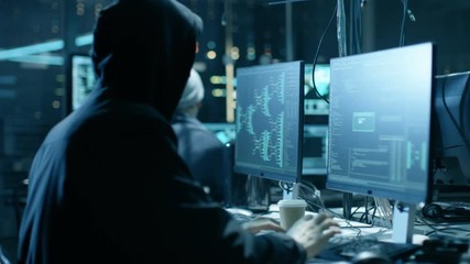 Aufkleber - Group of Hacktivists Organize Massive Data Breach Attack on Corporate Servers. They're in Underground Secret Location Surrounded by Displays and Cables. Shot on RED EPIC-W 8K Helium Cinema Camera.