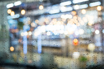 Wall Mural - drop on window car with the rainy night city