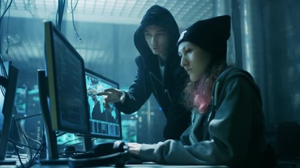 Aufkleber - Team of Internationally Wanted Boy and Girl Hackers Organize Advanced Virus Attack on Corporate Servers. Place is Dark and Has Multiple displays. Shot on RED EPIC-W 8K Helium Cinema Camera.