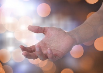 Poster - Hand open with sparkling light bokeh background