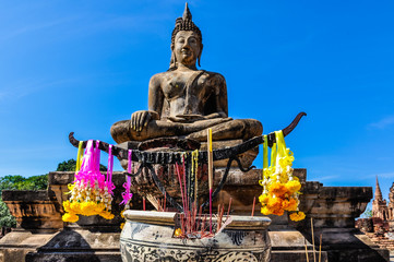 Wall Mural - Sitting Buddha statue in Sukhotai, Thailand