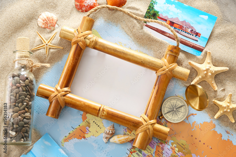 Travel concept. Composition with photo frame on world map background