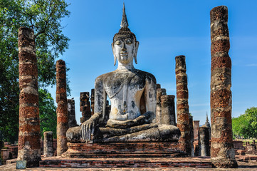 Wall Mural - Buddha statue sitting in Sukhotai, Thailand