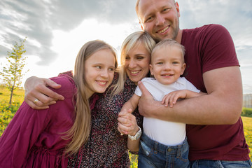 Happy family four. Blondie Big family, beautiful children