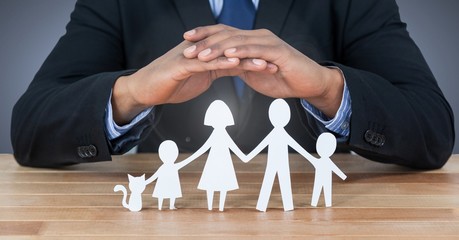 Poster - Cut out family under protective hands
