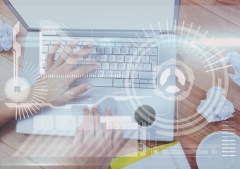 Poster - Hands of woman working on a laptop with digital graphics
