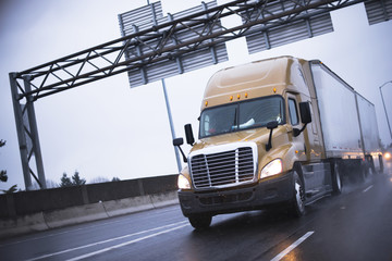 Wall Mural - Semi truck in raining highway reflection