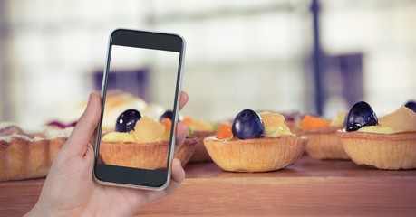 Poster - Hand taking picture of tart through smart phone