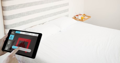 Poster - Cropped hands using digital tablet in bedroom