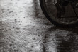 wheel of bicycle, Rain falls on the cement floor