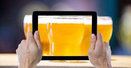 Poster - Cropped hands photographing beer glasses 