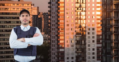 Wall Mural - Portrait of confident security guard with arms 