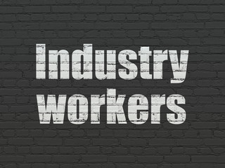 Manufacuring concept: Industry Workers on wall background