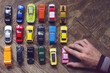© macondos - assorted colorful car collection on floor