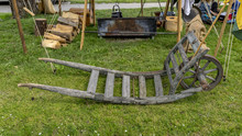 Medieval Wheelbarrow In Front Of A Campfire