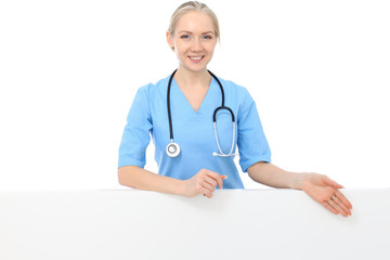 Smiling young nurse portrait isolated over white background. 