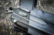 handgun in holster ready to firing position