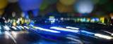 Fototapeta Zachód słońca - night traffic in the city 