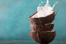Coconut And Coconut Vegan Milk Non Dairy On Blue Background With Copy Space