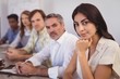 © wavebreak3 - Business people sitting in conference room