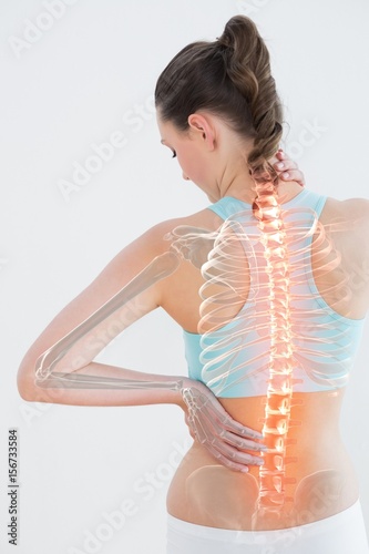 Fototapeta na wymiar Digitally generated image of female suffering from muscle pain