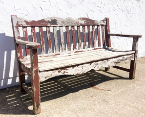 Peeling bench in sun