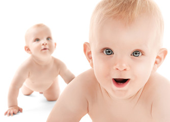 Wall Mural - Childhood concept. Cute babies on white background