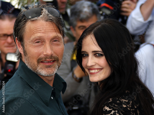 Cast Members Mads Mikkelsen And Eva Green Pose During A