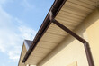 Home Guttering, Gutters, Plastic Guttering System, Guttering & Drainage Pipe Exterior against blue sky