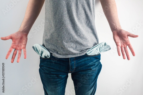 Fotomural Moneyless Concept. Male Shows Empty Pockets