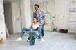 © didesign - Loving couple is having fun while they are renovating house