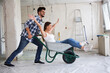© didesign - Loving couple is having fun while they are renovating house
