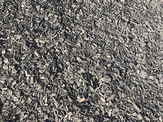 Wood chip mulch background texture.