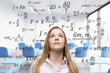 Blond woman in class with formulae