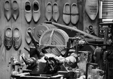 Workshop Filled With Wooden Clogs And Machinery
