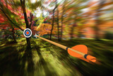 Fototapeta  - Arrow moving with precision and blurred motion toward an archery target, part photo, part 3D rendering