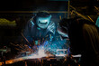 © bobo1980 - Team workers are welding part in factory