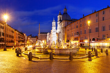 The Fountain of Neptune on the famous Piazza Navona Square at night, Rome, Italy.