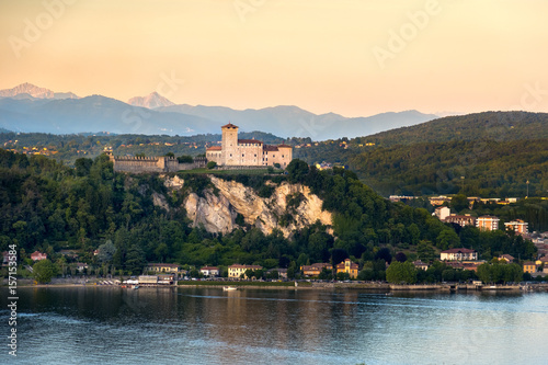 Fotografie, Obraz Rocca di Angera castle Lake Maggiore sunset Lombardy region Italy