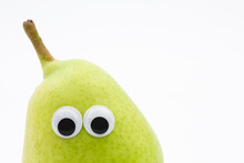 Green Pear With Googly Eyes On White Background - Pear Face